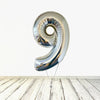 Ballon numéro 9 argent holographique XL (rempli d'hélium) 