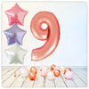 Bouquet de ballons numérotés en or rose 9 (rempli d'hélium) 